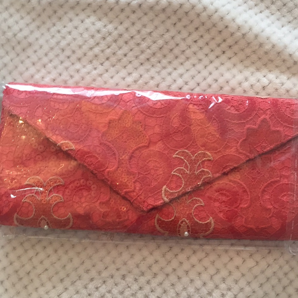Nigerian hand made red beaded clutch
